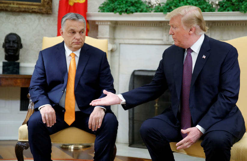 U.S. President Trump meets with Hungary's Prime Minister Orban at the White House in Washington (photo credit: CARLOS BARRIA / REUTERS)