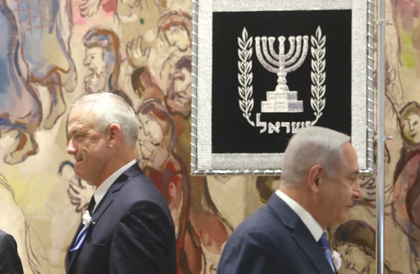 Tension was evident between Blue and White leader Benny Gantz and Prime Minister Benjamin Netanyahu at the opening of the Knesset’s new session on April 30 (photo credit: MARC ISRAEL SELLEM)