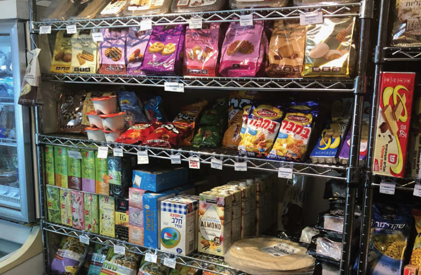 ISRAELI PRODUCTS line the shelves at Chabad Korea’s kosher food store. (photo credit: Courtesy)