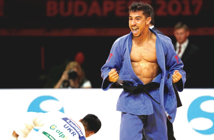  ISRAELI JUDOKAS, such as Tal Flicker (above), have often been treated with hostility when competing in Arab nations, a practice that the International Judo Federation is trying to curb. (photo credit: REUTERS)