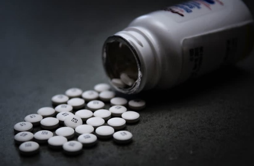 Prescription pain pills are dumped out on a table. (photo credit: U.S. AIR FORCE PHOTO ILLUSTRATION/TECH. SGT. MARK R. W. ORDERS-WOEMPNER)