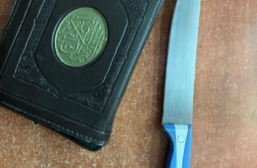 knife and a Koran (photo credit: POLICE SPOKESPERSON'S UNIT)