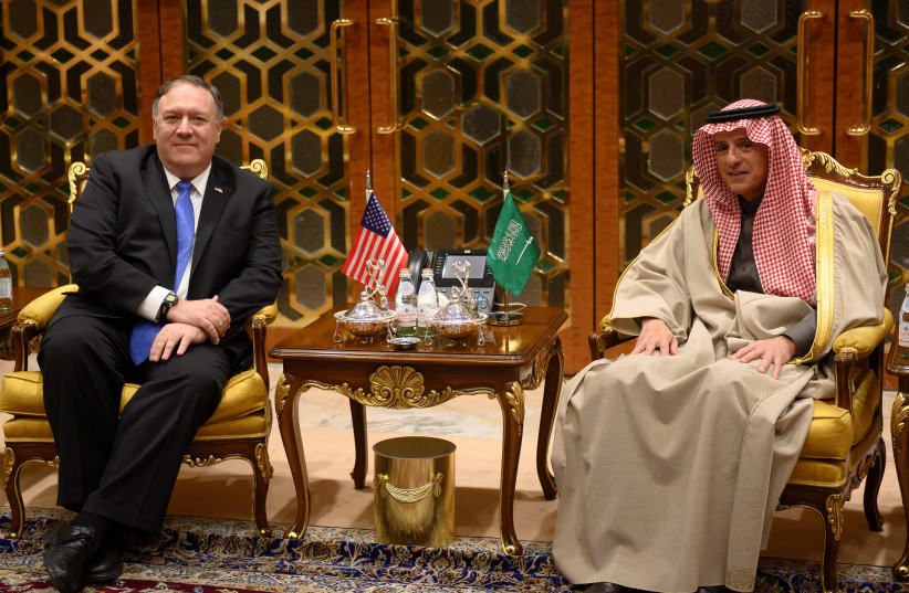 U.S. Secretary of State Mike Pompeo meets with Saudi's Minister of State for Foreign Affairs Adel al-Jubeir upon his arrival in Riyadh, Saudi Arabia January 13, 2019 (photo credit: ANDREW CABALLERO-REYNOLDS/REUTERS)