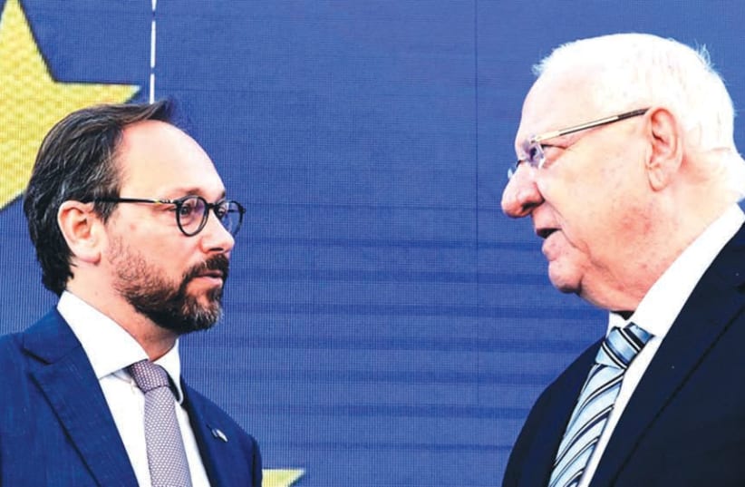 PRESIDENT REUVEN RIVLIN with Ambassador Emanuele Giaufret, head of the delegation of the European Union, on Europe Day. (photo credit: MARK NEYMAN/GPO)