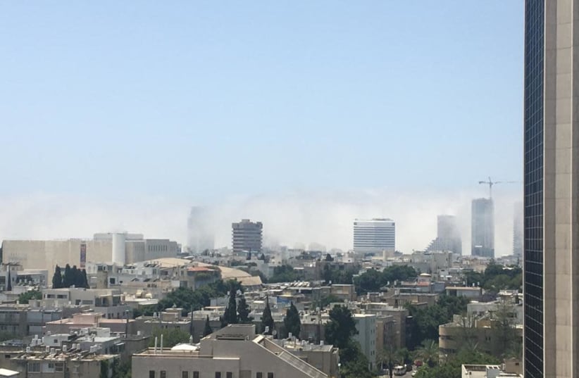 Dust storm envelops Tel Aviv, Wednesday May 22, 2019 (photo credit: SIMON ABRAHAM)