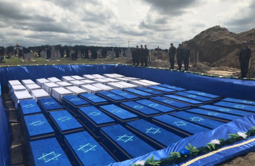 Coffins, containing the bones of over 1000 Jews murdered in Holocaust await burial in Belarus. (photo credit: USA EMBASSY MINSK)
