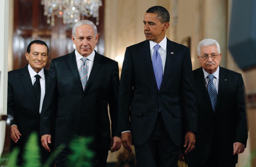 THEN-US president Barack Obama appears with Egypt’s president Hosni Mubarak, Prime Minister Benjamin Netanyahu and Palestinian President Mahmoud Abbas in the East Room of the White House in Washington in 2010.  Peace process officials from the Clinton, Bush and Obama administrations wasted no time i (photo credit: JASON REED/REUTERS)