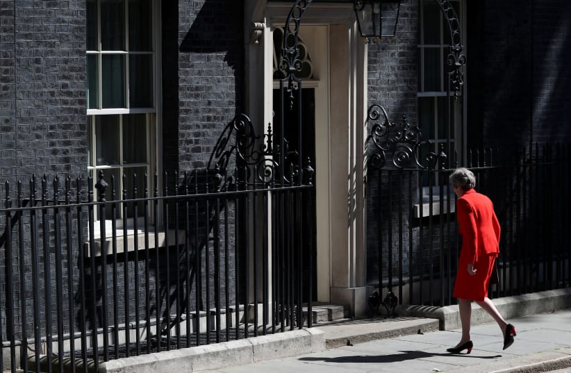 British Prime Minister Theresa May leaves after making a statement, at Downing Street in London, Britain, May 24, 2019. (photo credit: REUTERS / HANNAH MCKAY)
