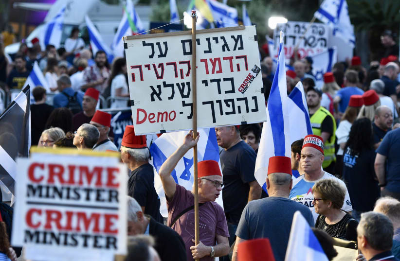 Thousands gather at a mass rally in Tel Aviv "for democracy" and against controversial legislation, 2019. (photo credit: AVSHALOM SASSONI)