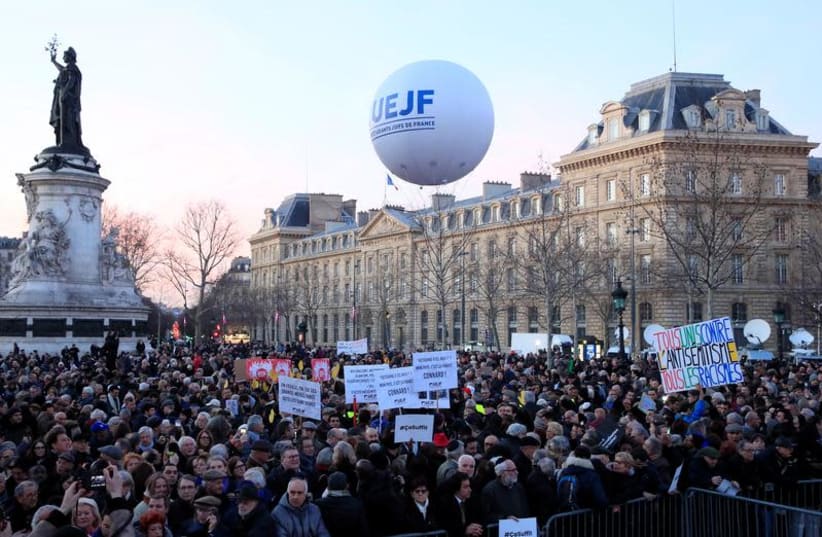 People attend a national gathering to protest antisemitism and the rise of anti-Semitic attacks in the Place de la Republique in Paris, France, February 19, 2019. (photo credit: REUTERS/GONZALO FUENTES)