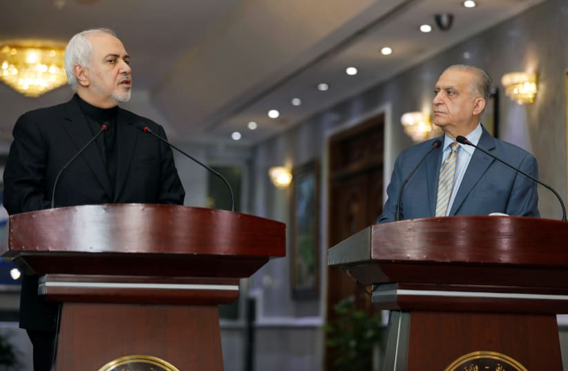 Iranian Foreign Minister, Mohammad Javad Zarif, speaks during a news conference with Iraqi Foreign Minister Mohamed Ali Alhakim in Baghdad, Iraq May 26, 2019 (photo credit: REUTERS/KHALID AL MOUSILY)