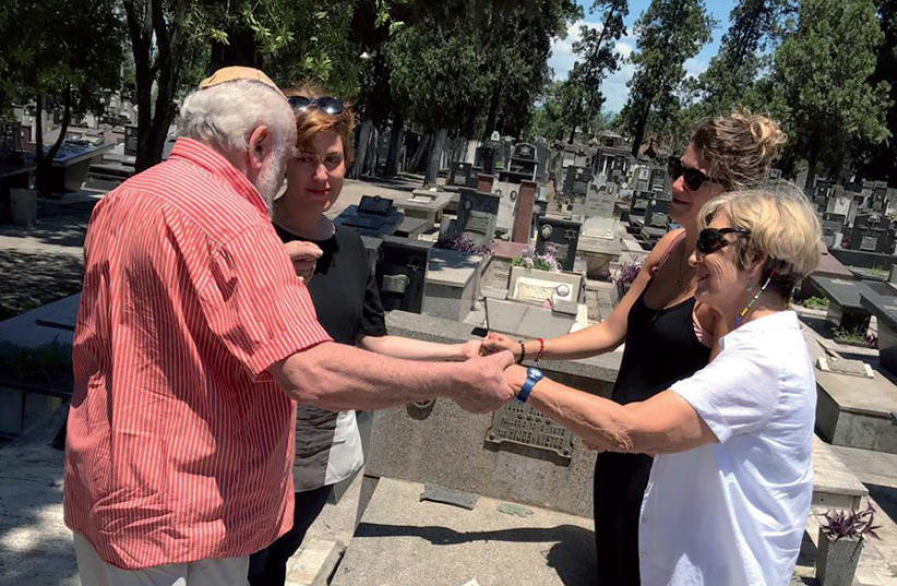 Praying over Fanny Milstein’s grave in Tucumán, Argentina (photo credit: PAULA SLIER)