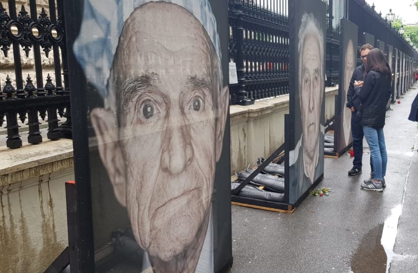 Photos of the exhibit in Vienna on Tuesday as activists gathered to protect it from further vandalism (photo credit: Courtesy)