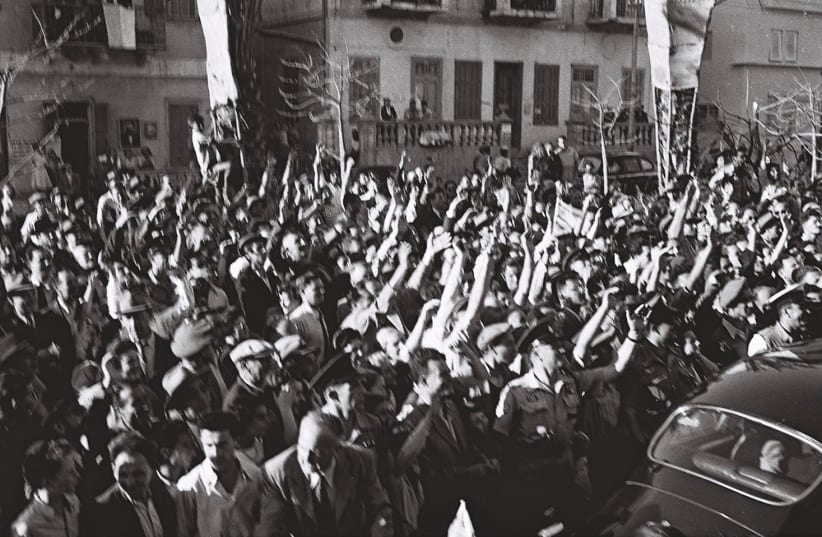 CHEERING THE creation of Israel in 1948. (photo credit: REUTERS)