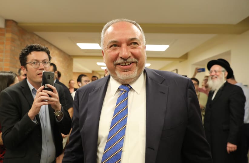 Avigdor Liberman exits the Knesset following the passing of a Knesset dispersal, 2019. (photo credit: MARC ISRAEL SELLEM)