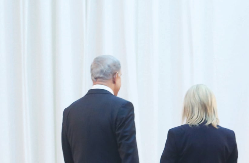 PRIME MINISTER Benjamin Netanyahu and his wife Sara – who will benefit more from another round of elections? (photo credit: MARC ISRAEL SELLEM)