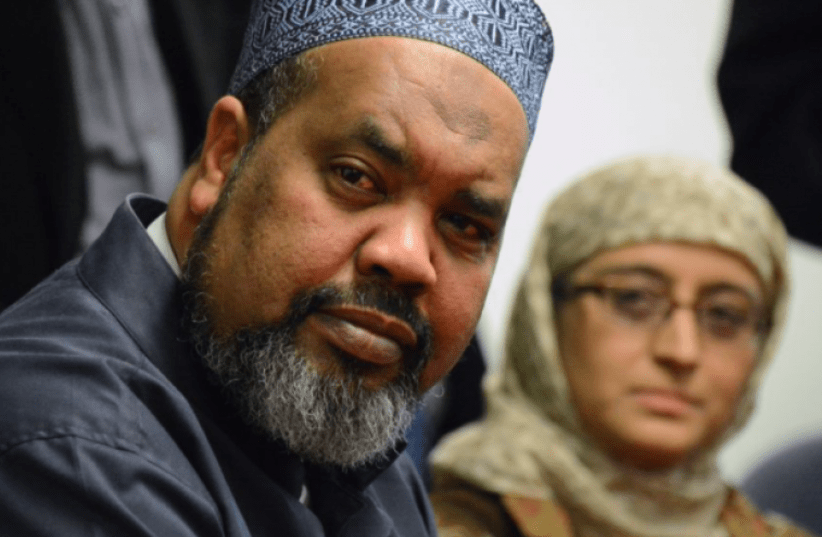 Mohamed Magid, iman of All Dulles Area Muslim Society Center in Sterling, Va., spoke at an evening vigil on Oct. 29, 2018 at Adas Israel Congregation in Washington, D.C., in the wake of the Oct. 27 shooting at the Tree of Life*Or L'Simcha Synagogue in Pittsburgh, Pa. (photo credit: screenshot)