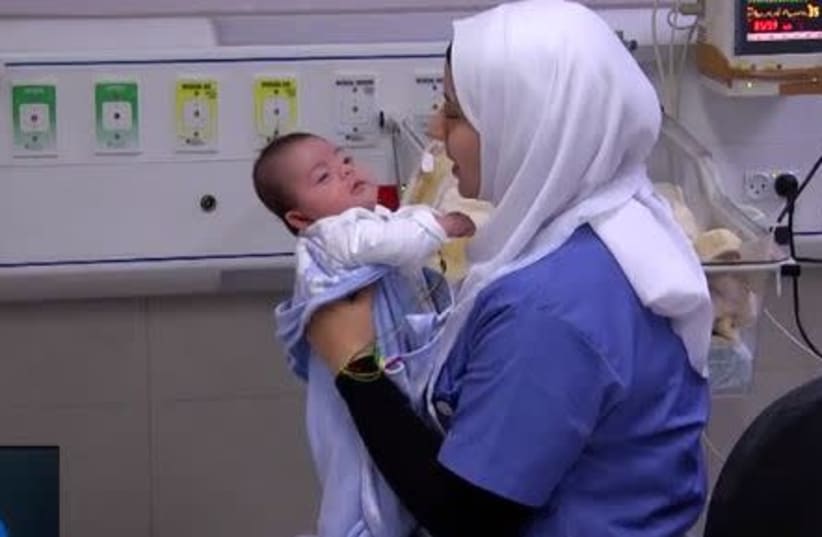 Baby and mother from Gaza Strip are reunited in Israel. (photo credit: screenshot)