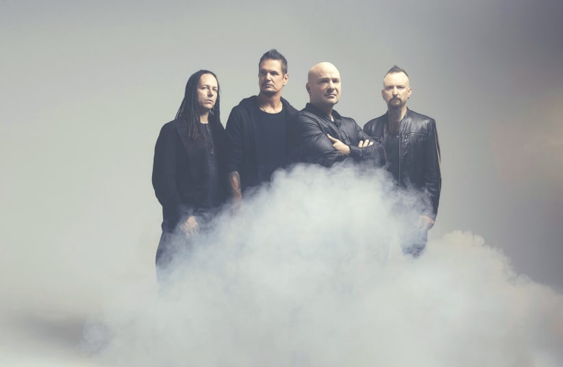 DISTURBED, WITH David Draiman (third from left), will be making their Israel debut on July 2 (photo credit: CAA LONDON)