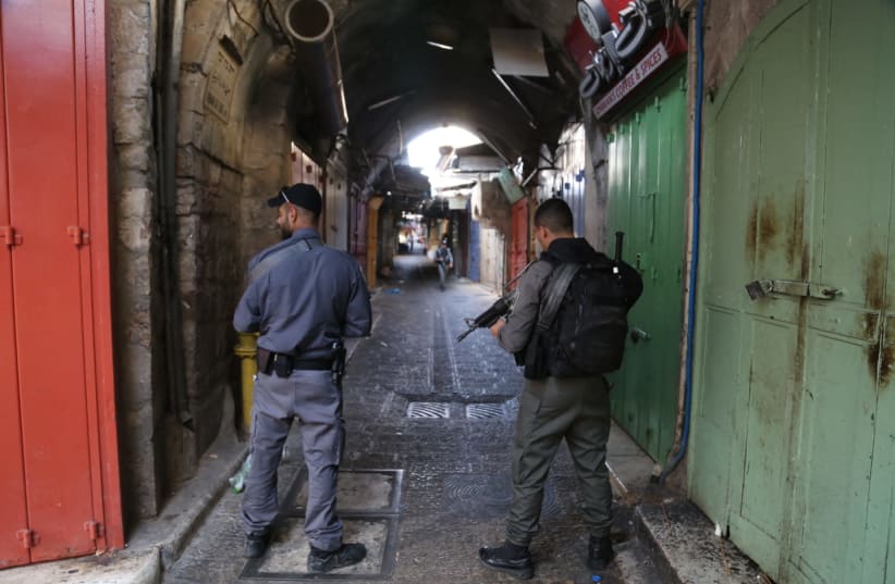 Israel Border Police guard an area in the Arab market in Jerusalem's Old City following a terrorist attack (photo credit: ISRAEL POLICE)