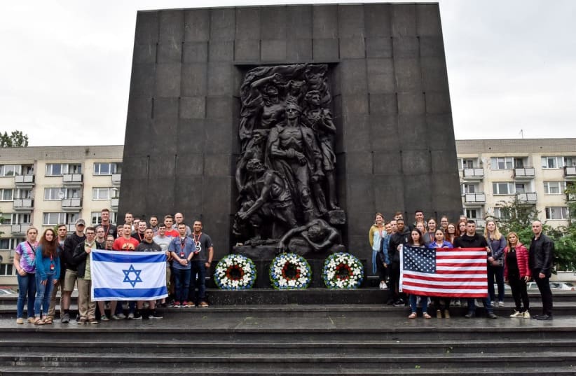 US military cadets visit the Warsaw Ghetto Uprising memorial in Poland as part of 'Our Soldier's Speak' Israel Strategy and Policy Tour (photo credit: OUR SOLDIERS SPEAK)