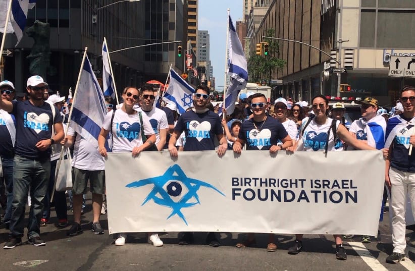 Birthright Israel members attend the Celebrate Israel Parade in New York City, 2019. (photo credit: HALEY COHEN)