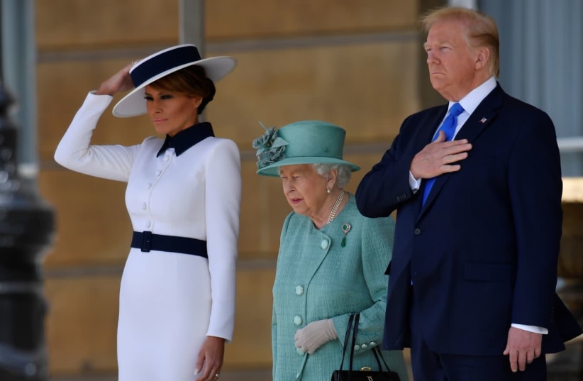  U.S. President Donald Trump and First Lady Melania Trump meet with Britain's Queen Elizabeth at Buckingham Palace, in London, Britain, June 3, 2019.  (photo credit: TOBY MELVILLE/REUTERS)