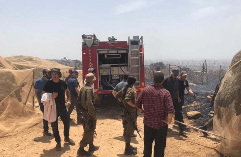 IDF and emergency fire personnel deal with a fire at cherry tree grove in the Etzion Bloc  (photo credit: YARON ROSENTHAL)