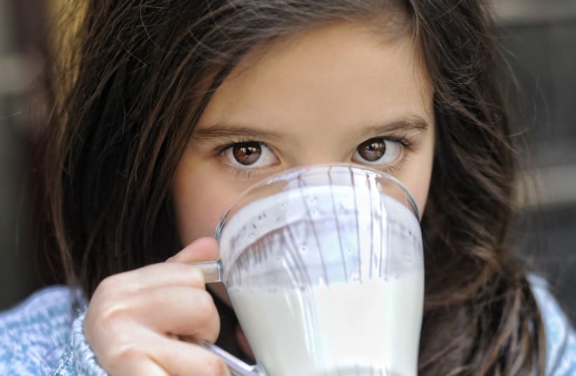 Girl drinking milk  (photo credit: Courtesy)