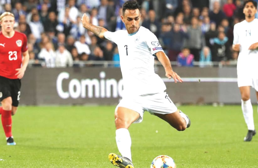 ERAN ZAHAVI will have to be in top form once again as Israel visits Latvia and Poland this weekend in Euro 2020 qualifying. In the blue-and-white’s first two games, in March, Zahavi scored four total goals in a victory over Austria and a draw with Slovenia. (photo credit: REUTERS)