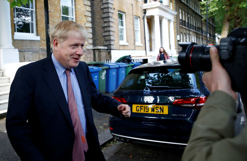 Former British Foreign Secretary Boris Johnson, who is running to succeed Theresa May as Prime Minister, leaves his home in London, Britain, June 5, 2019 (photo credit: HENRY NICHOLLS/REUTERS)