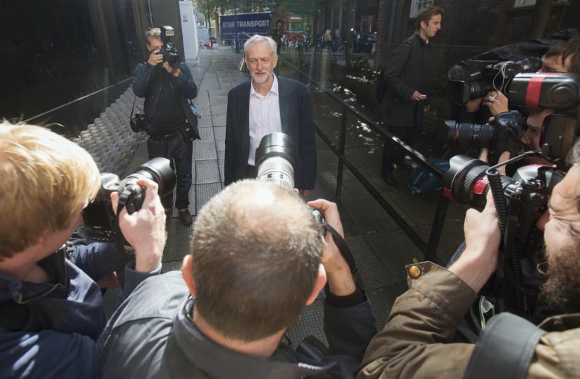Britain's opposition Labour Party leader Jeremy Corbyn leaves his party's headquarters in London, Britain September 14, 2015 (photo credit: NEIL HALL/REUTERS)