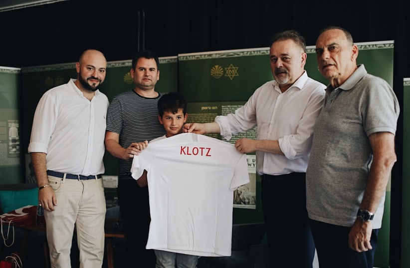[From Left to Right] Director of From The Depths Jonny Daniels, Yoav and Eitan Dekel, Director of the the Polish Football association PZPN Janusz Basalajand  Mr. Avram Grant.  (photo credit: FROM THE DEPTHS)