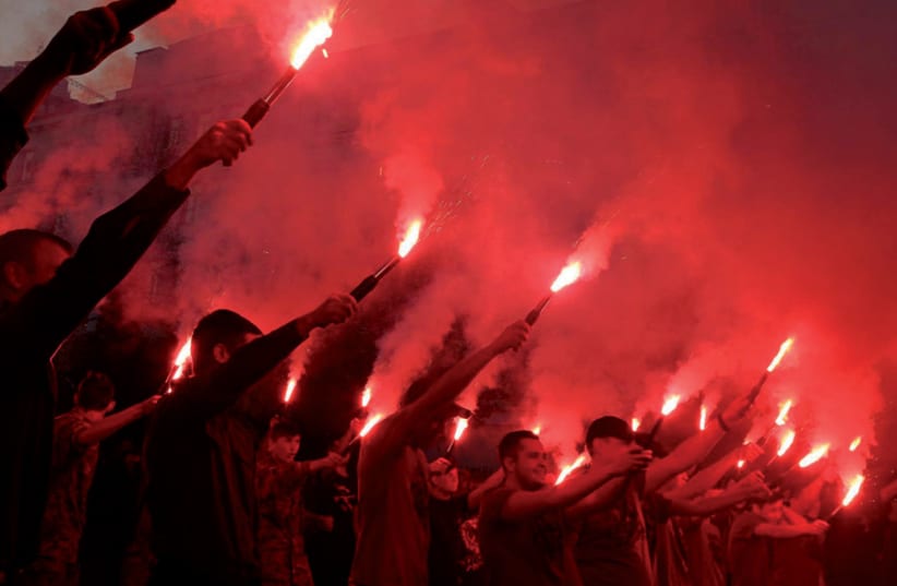 Ukrainian ultranationalists march with torches in Kiev (photo credit: SVOBODA)
