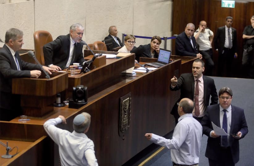 Chaos erupts in the Knesset ahead of its vote to dissolve itself on May 29 (photo credit: MARC ISRAEL SELLEM)