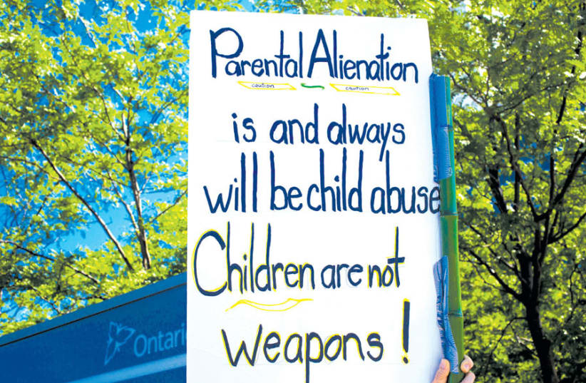 AT A family court protest in Ontario. (photo credit: EVAN DELSHAW/FLICKR)