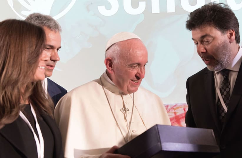 RIGHT TO LEFT: Dario Werthein, Chair of the World ORT Board of Trustees, Pope Francis , Avi Ganon, Director General and CEO of World ORT, and Cecilia Werthein. (photo credit: BERNARDO SAN TORCUATO)