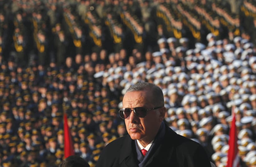 TURKISH PRESIDENT Tayyip Erdogan attends a ceremony at the mausoleum of Mustafa Kemal Ataturk last year (photo credit: REUTERS/UMIT BEKTAS)