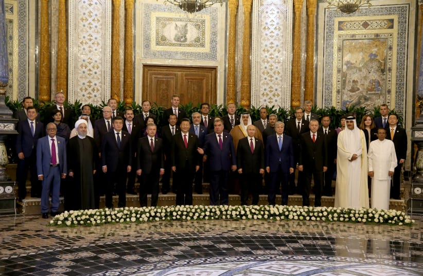 Leaders and officials pose for a group photo during CICA summit in Dushanbe, 2019. (photo credit: CEM OKSUZ/TURKISH PRESIDENTIAL PRESS OFFICE/HANDOUT VIA REUTERS)