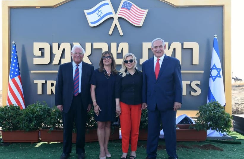 US Ambassador to Israel David Friedman [L] his wife Tammy Deborah Sand, Sara Netanyahu, and Prime Minister Benjamin Netanyahu [R] near the sign of Trump Heights in the Golan  (photo credit: KOBI GIDON / GPO)