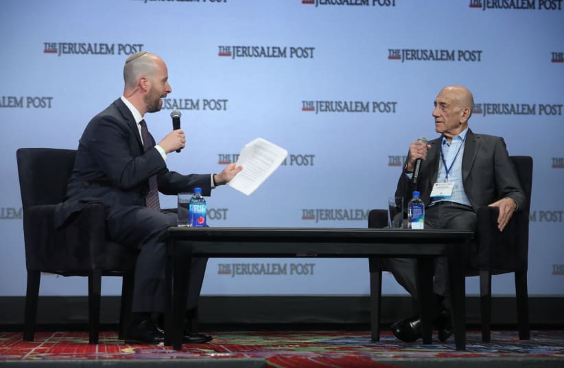 Former Israeli Prime Minister Ehud Olmert (R) speaks to Yaakov Katz at the 8th annual Jerusalem Post Conference (photo credit: MARC ISRAEL SELLEM/THE JERUSALEM POST)