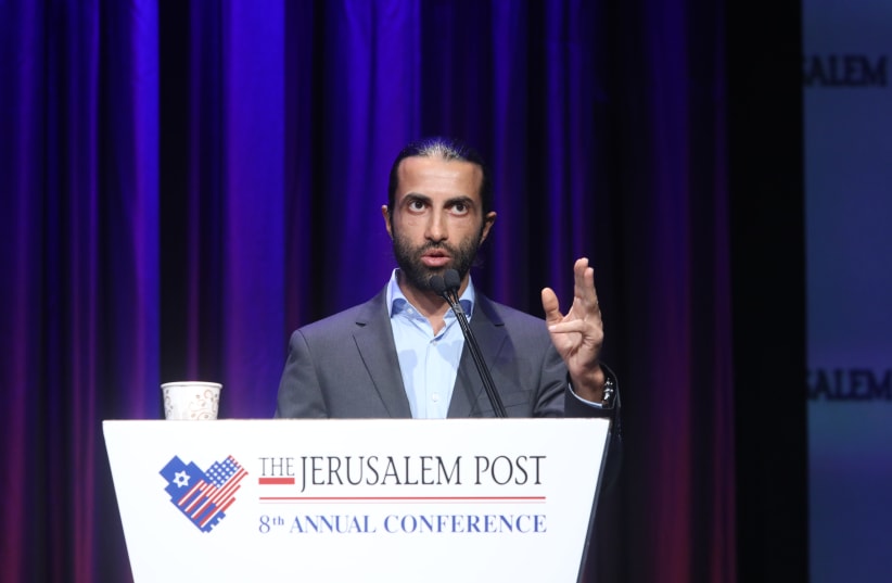 Mosab Hassan Yousef, 'The Green Prince,' speaks at the Jerusalem Post annual conference in New York (photo credit: MARC ISRAEL SELLEM/THE JERUSALEM POST)