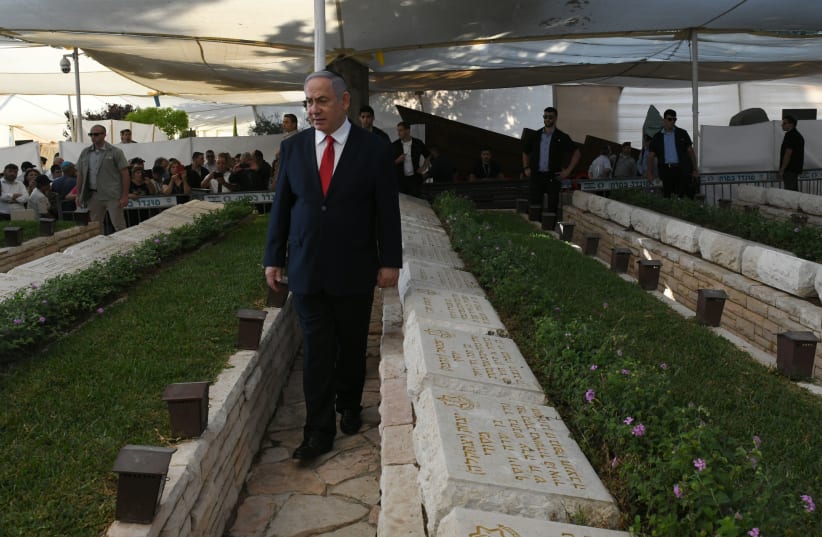 Benjamin Netanyahu at a memorial service (photo credit: GPO)