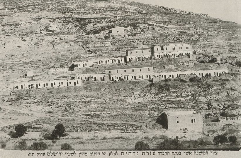 AN 1891 photo shows houses built by the Ezrat Niddachim charitable organization in Silwan for poor Yemenite Jews in the 1880s. (photo credit: Wikimedia Commons)