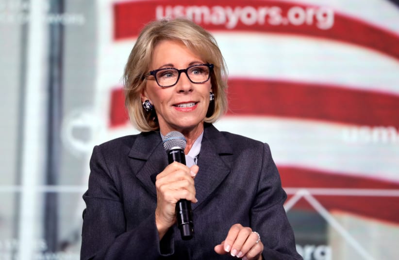 Education Secretary Betsy DeVos speaks at the Conference of Mayors winter meeting in Washington (photo credit: REUTERS/YURI GRIPAS/FILE PHOTO)
