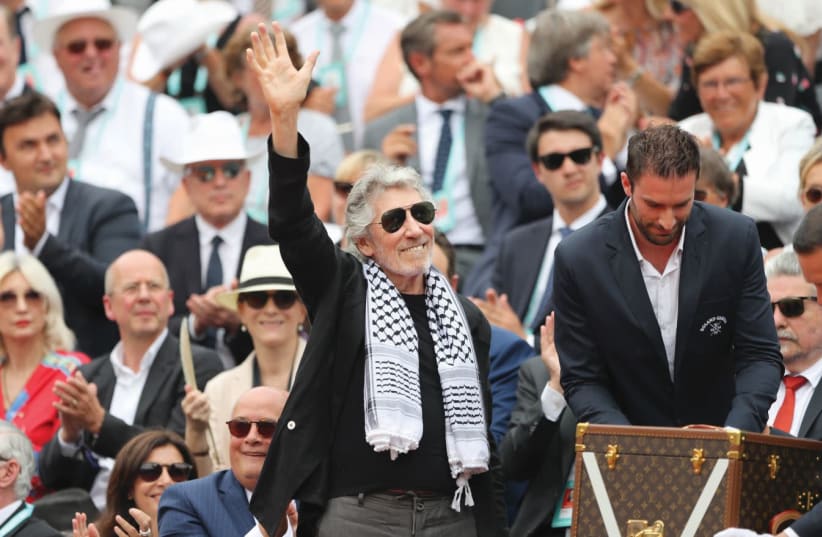 Roger Waters, draped with a Palestinian keffiyeh (photo credit: REUTERS)
