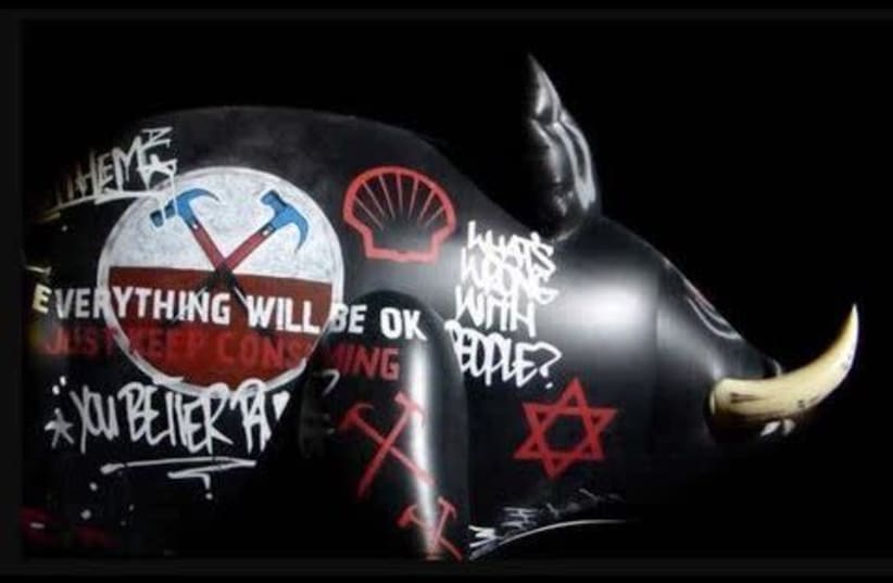 An inflatable pig with a Star of David painted on it was displayed during a Roger Waters performance of The Wall in Belgium in 2013 (photo credit: Courtesy)