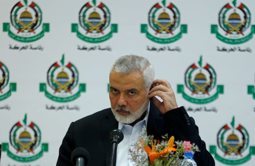 Hamas Chief Ismail Haniyeh attends a meeting with members of international media at his office in Gaza City, June 20, 2019 (photo credit: MOHAMMED SALEM/ REUTERS)