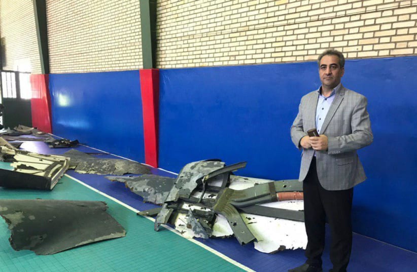 Pieces of the American drone that were shot down by Iran in the Straits of Hormuz (photo credit: Courtesy)