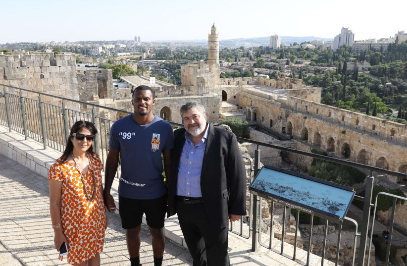 NFL quarterback Deshaun Watson overlooking the old city in Jerusalem (photo credit: MARC ISRAEL SELLEM/THE JERUSALEM POST)